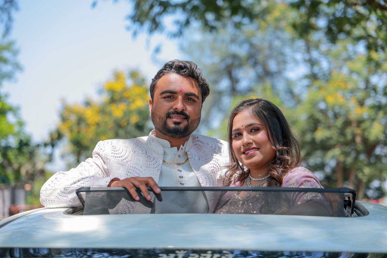 Mastering the First Impression: Your intriguing post title goes here A happy couple in traditional attire posing together outdoors, celebrating love.